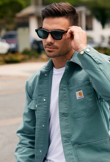 Man wearing sunglasses that are wide width