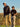 Two men on a golf course with golf clubs